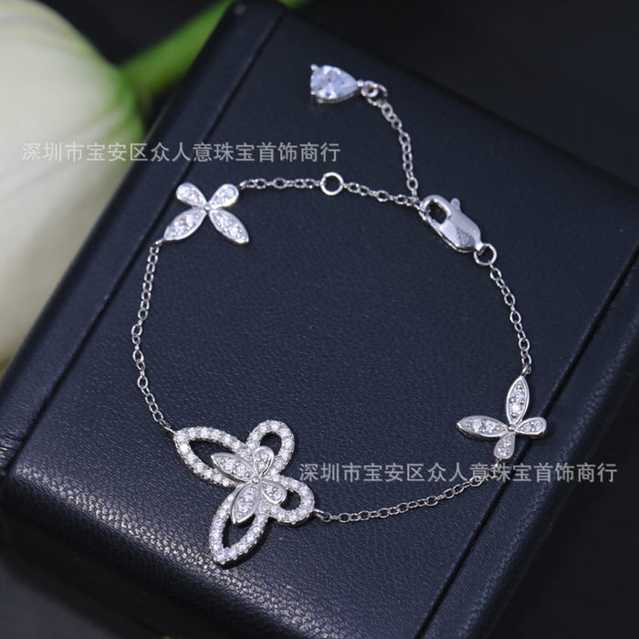 Gejia Phantom Butterfly Bracelet S925 Silver Plated 18K Gold Niche Design Hollow Four Flowers Blossom Full Diamond Bracelet